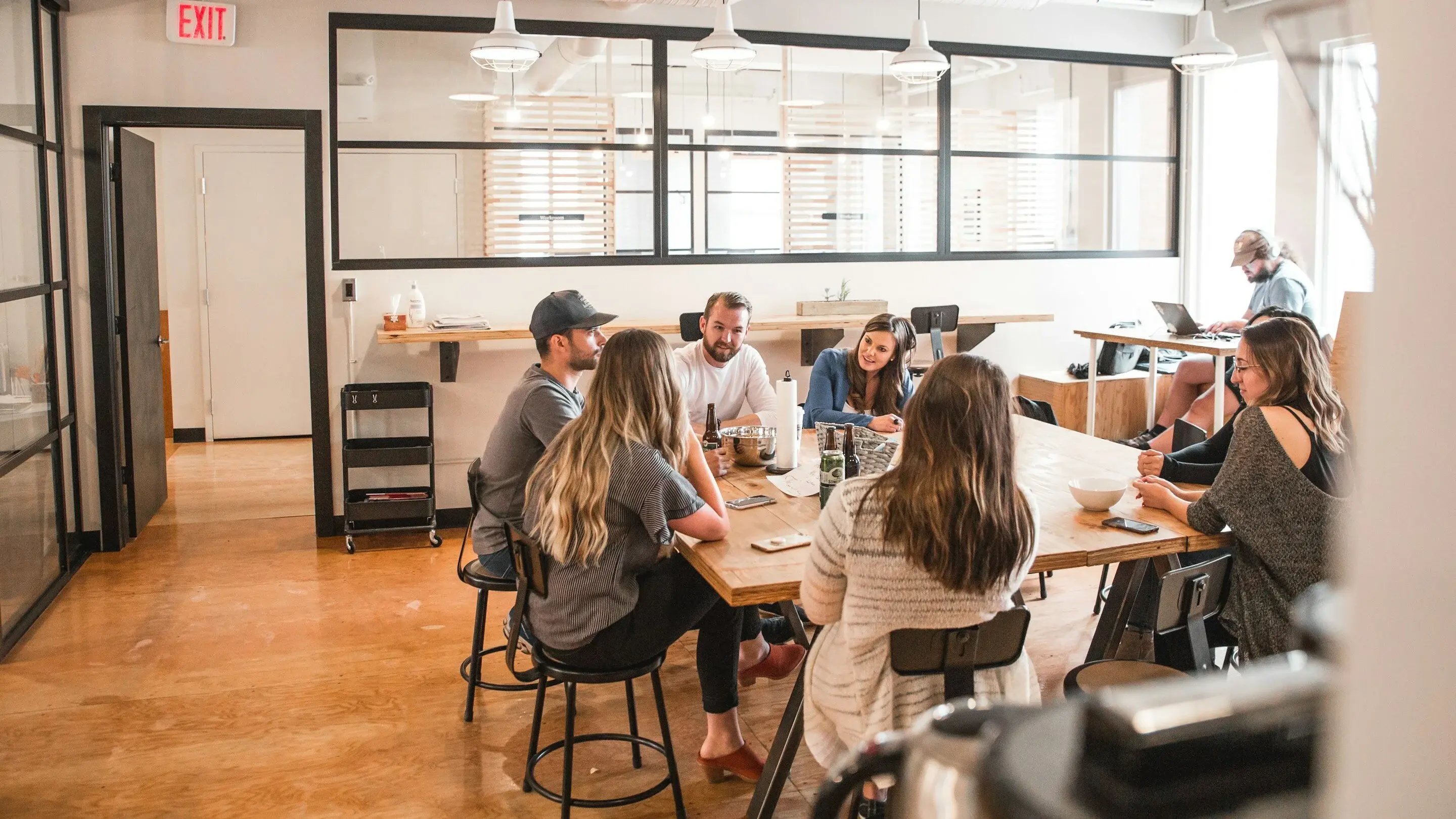 Group of people sitting around a table
