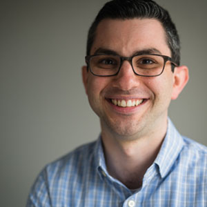 Dan Wasserman w/ glasses headshot